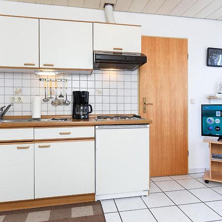 Ferienwohnungen mit Balkon im Haus Seekieker Bensersiel Exterior foto